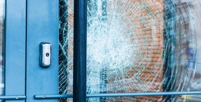 Smashed window in Crawley